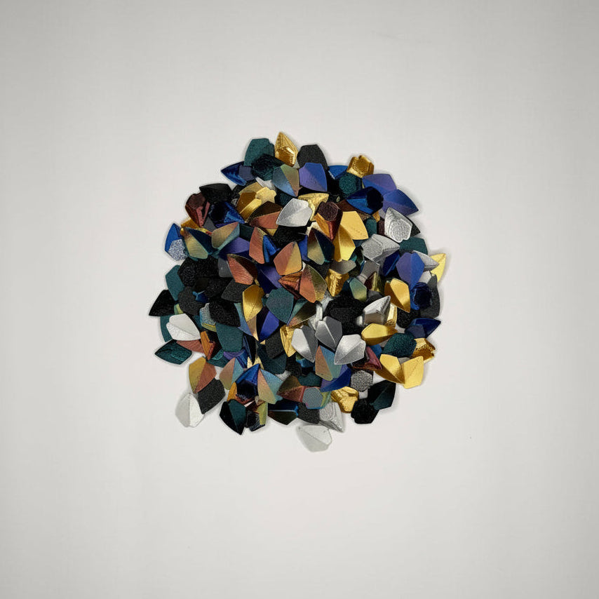 Multicolored loose Dragon Scales on a gray background