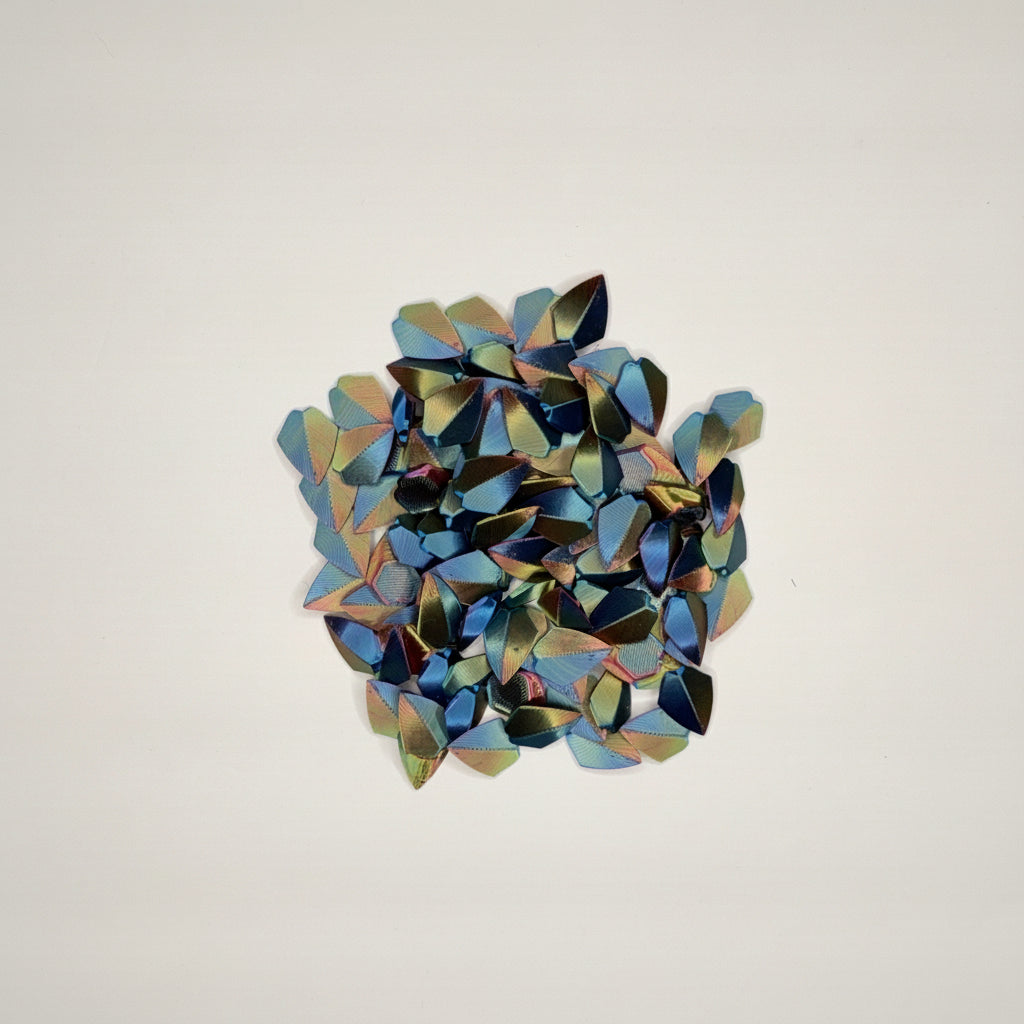 blue-red-gold loose dragon scales on a light gray background