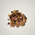 Red, black, gold loose dragon scales on a light gray background
