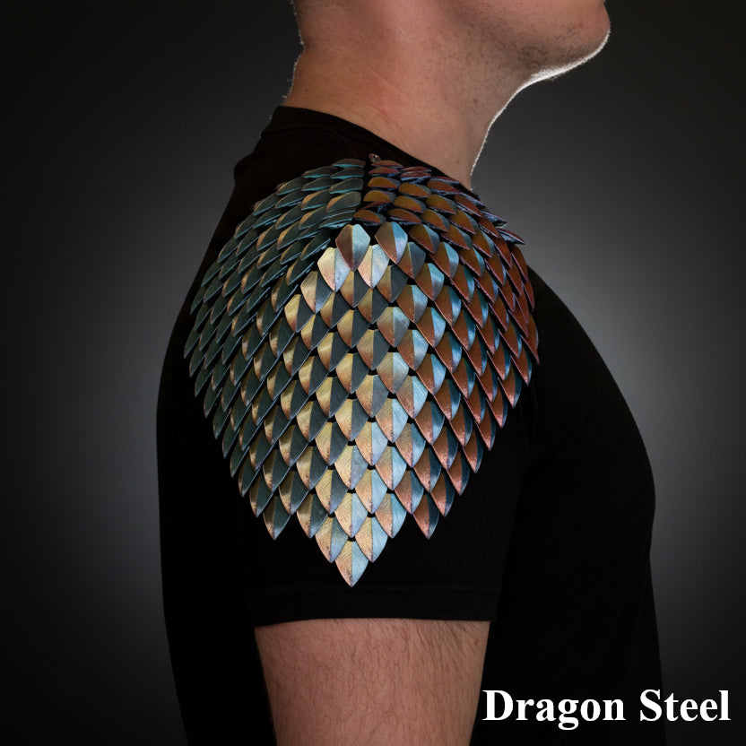 Person wearing a dragon scale shoulder piece with 'Dragon Steel' branding on a dark background