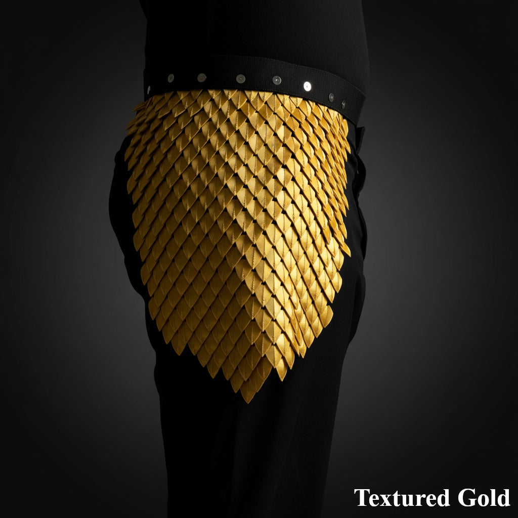 Textured gold skirt with black belt on a dark background