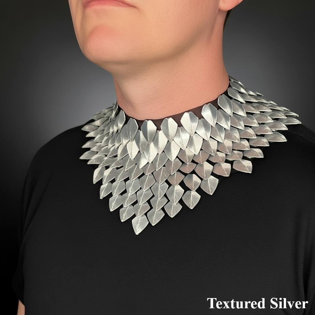 Textured silver necklace on a black background